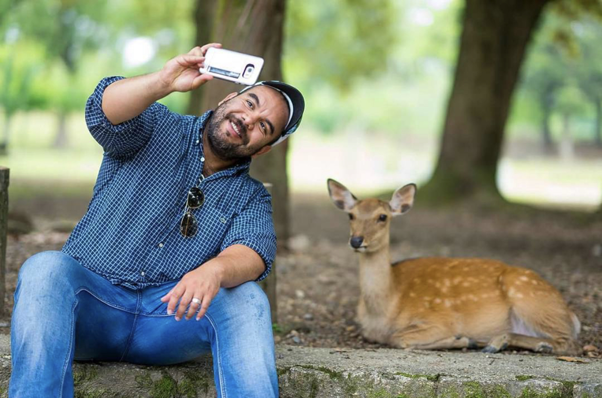 Dan and a deer in Japan